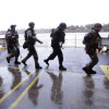 During a drill, SWAT team members prepare to secure a ship in Bainbridge Island, Wash.